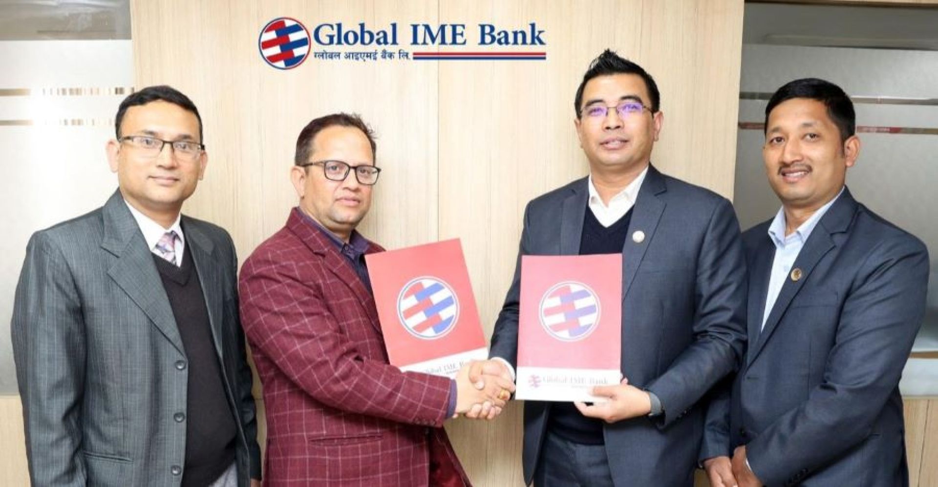 ग्लोबल आइएमई बैंकले एनएफपिजेका सदस्यलाई क्यामरा खरिद किन्न विना धितो कर्जा दिने